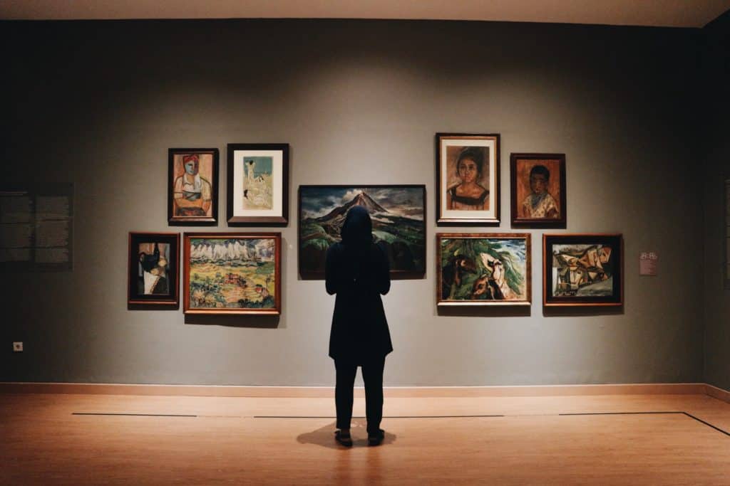Man Standing in an art gallery