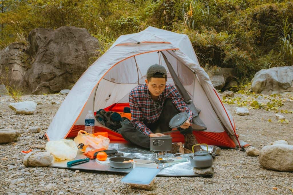 Man camping in a tent